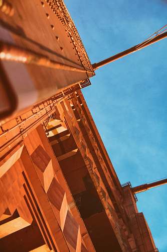 golden gate bridge low angle photography of wooden building under blue sky san francisco